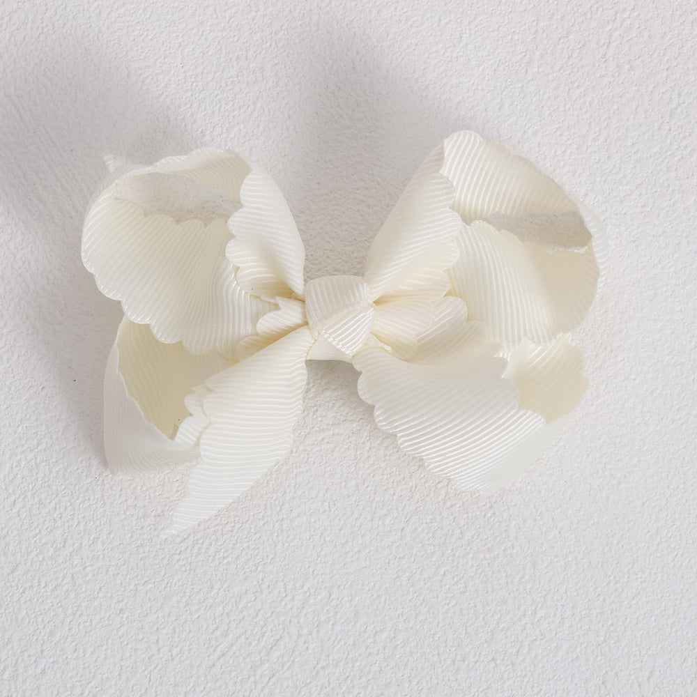 miroksh bow styled in toddler ponytail adding polished everyday look