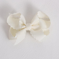 miroksh bow styled in toddler ponytail adding polished everyday look