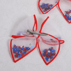 Miroksh bows styled in hair side profile adding patriotic flair to an outfit