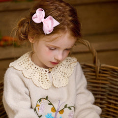 Miroksh alligator clip close-up showing secure grip for comfortable wear