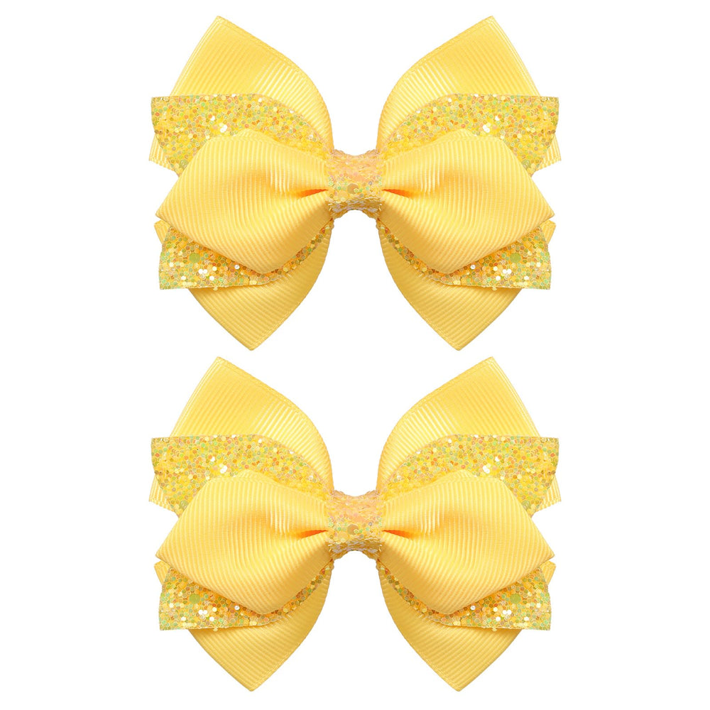 Miroksh front packaging showing two glitter yellow bows and gift-ready presentation benefit