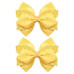 Miroksh front packaging showing two glitter yellow bows and gift-ready presentation benefit