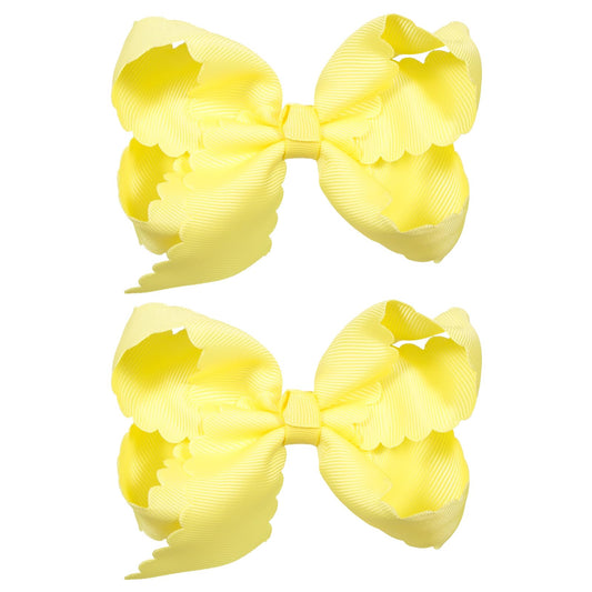 miroksh front view of lemon yellow bow pair highlighting bright color and polish