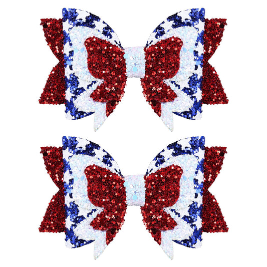 Miroksh front view of two patriotic glitter hair bows showing festive colors and secure clip