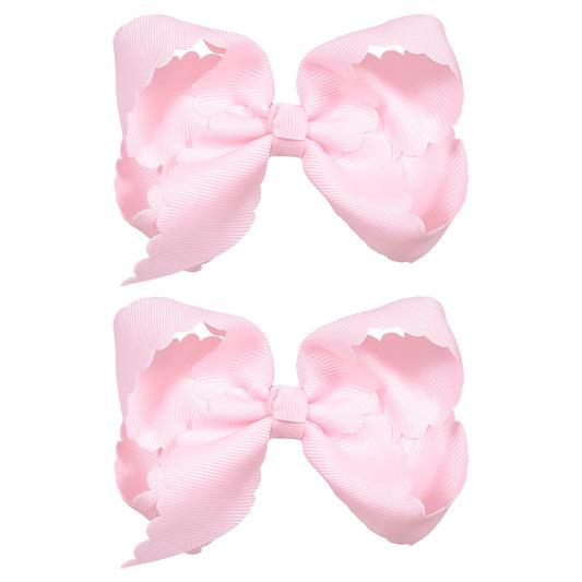Miroksh front view pair showing pink scalloped grosgrain bows, polished look
