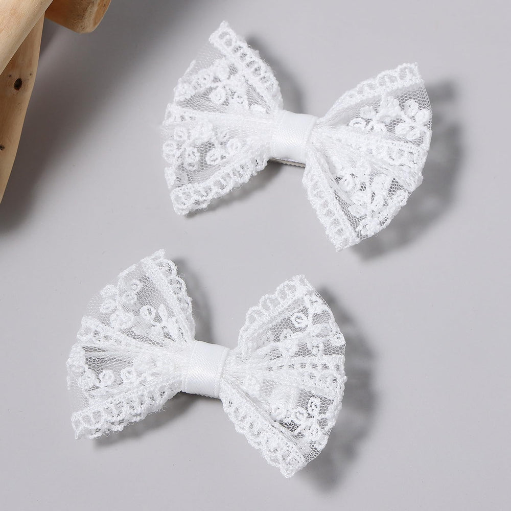 Miroksh front view showing delicate white bows and classic elegance