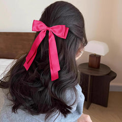 Miroksh bow clipped on ponytail showing instant polished hairstyle benefit