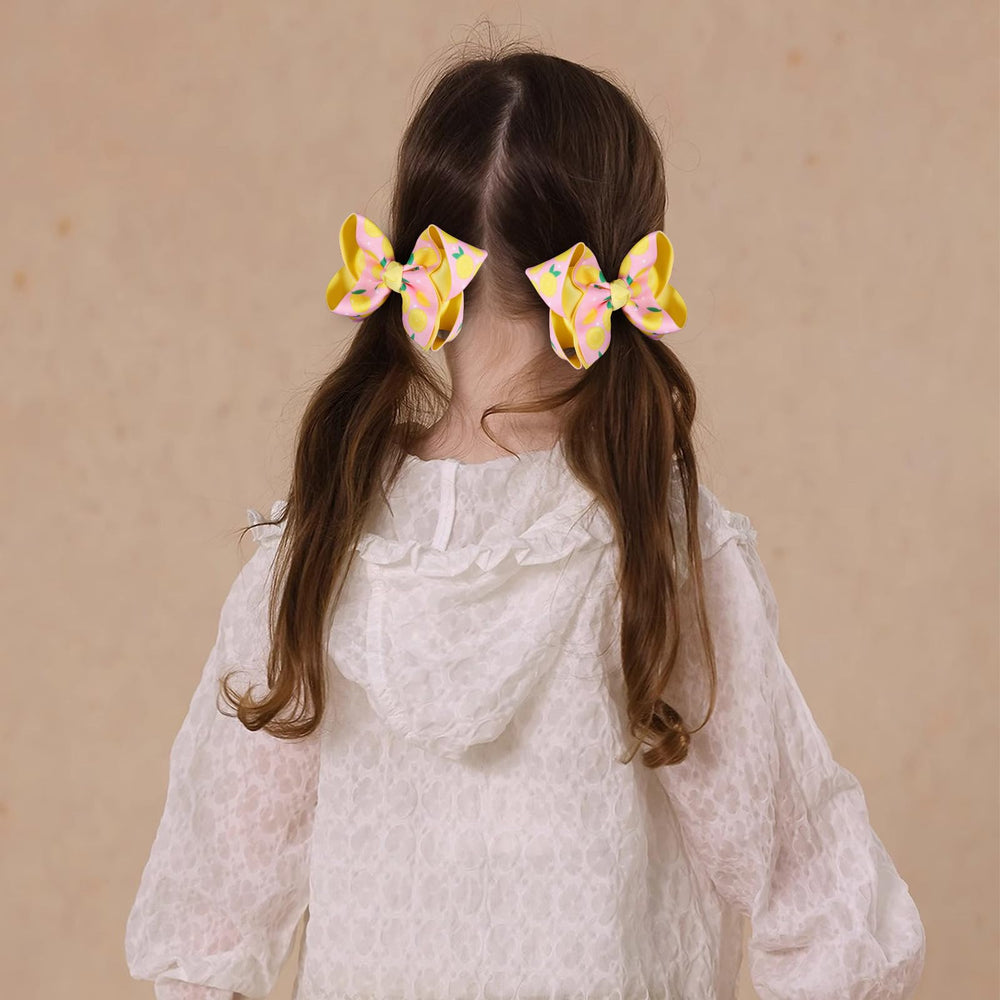 Miroksh lemon bow worn on child offering playful summer styling