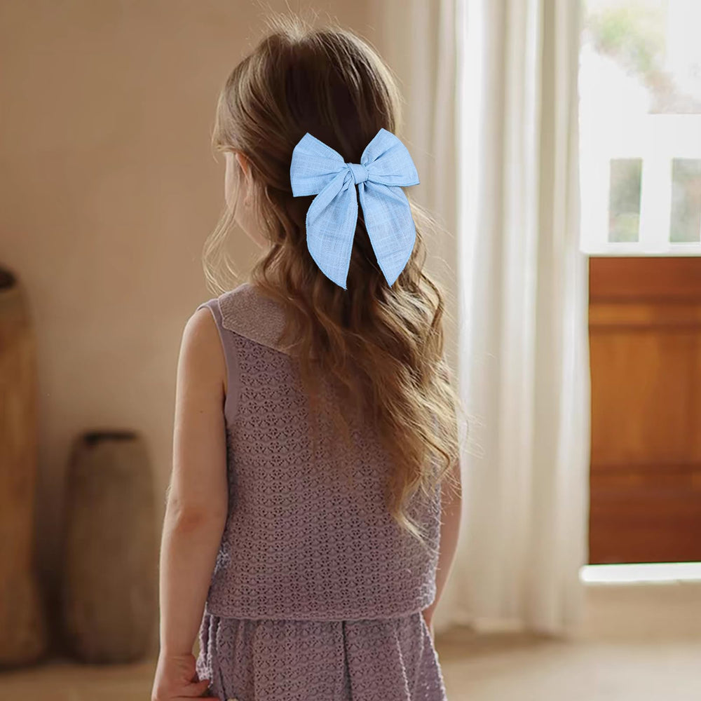 Miroksh bow worn in ponytail demonstrating lightweight, comfortable wear