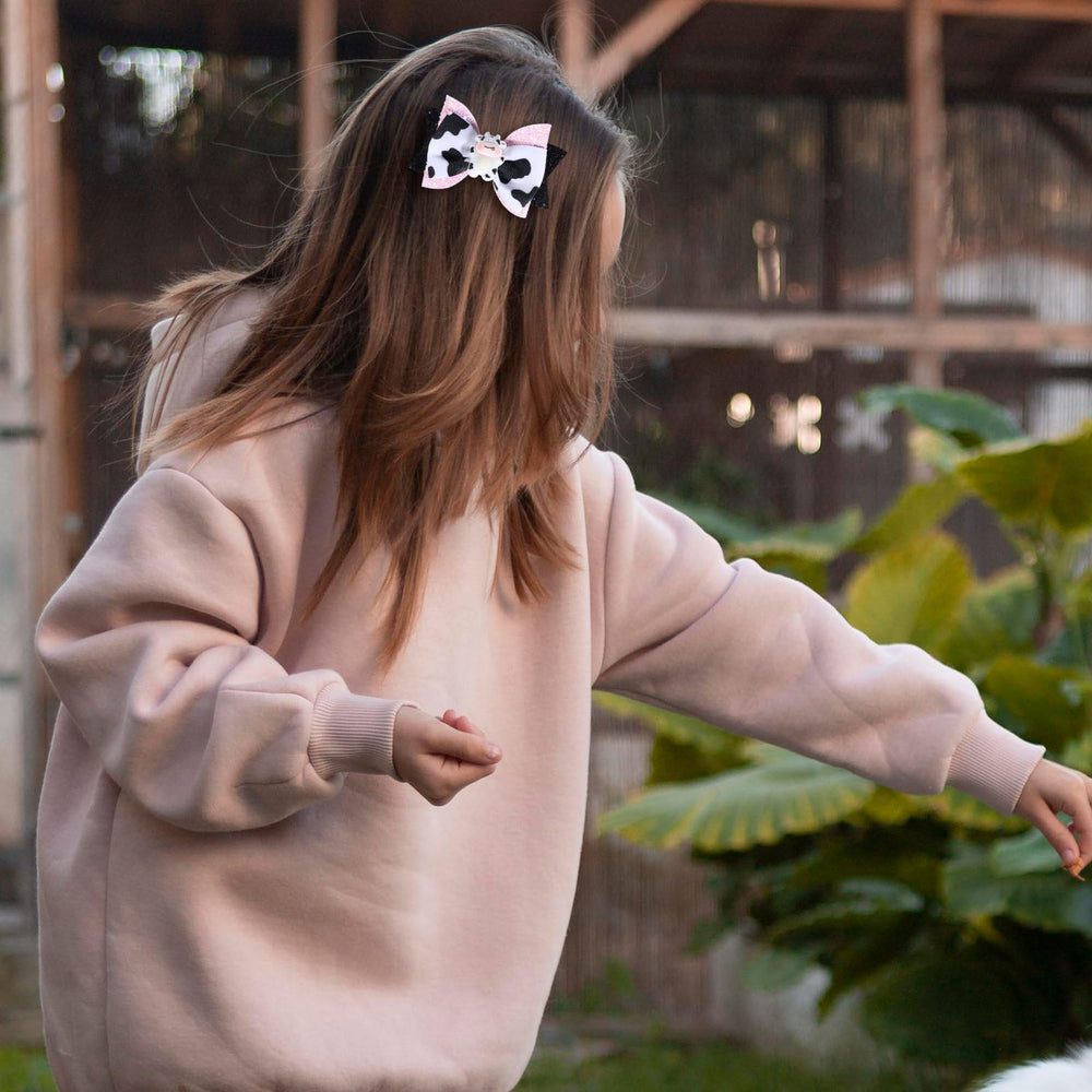 Miroksh paired with cow costume showing themed party coordination benefit