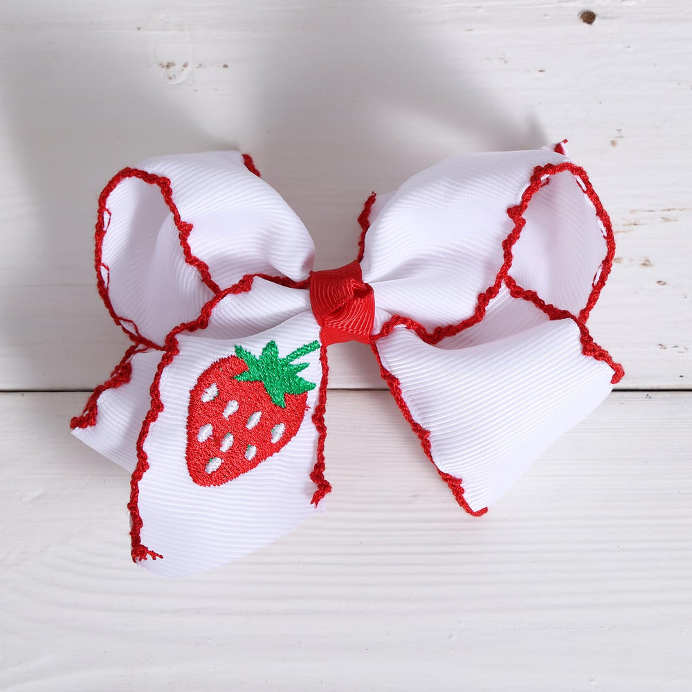 miroksh embroidered strawberry texture close-up highlighting handmade detail and charm