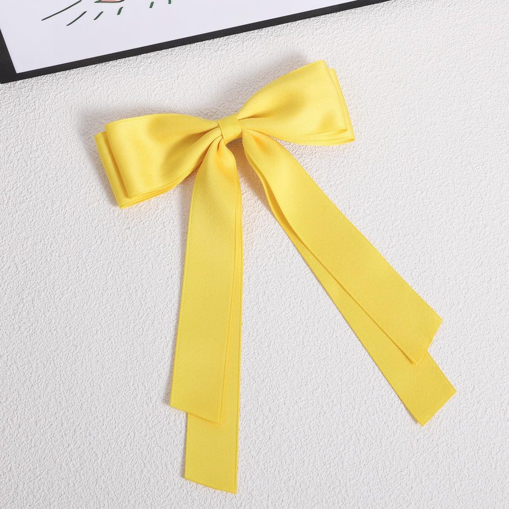 Miroksh two yellow bows laid flat showing set variety and styling options