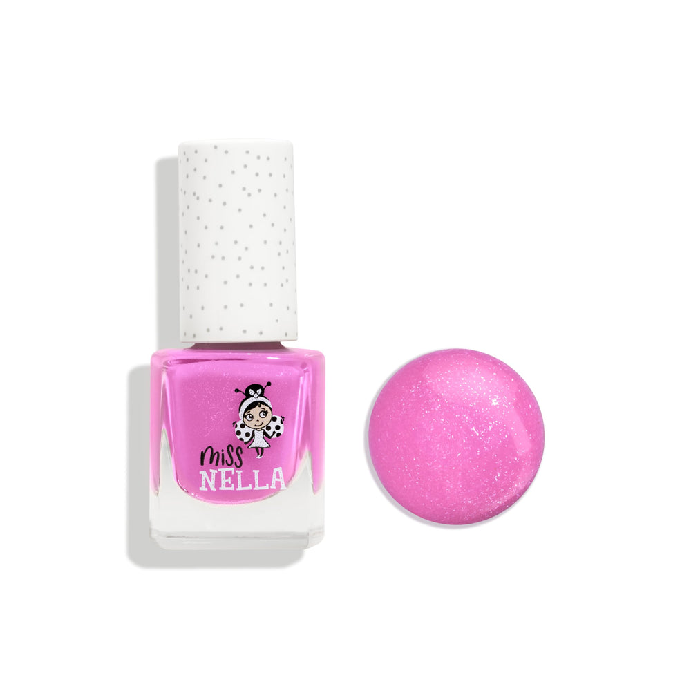 MISS NELLA swatch on fingertips demonstrating smooth coverage and playful color