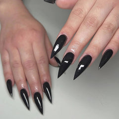 MISUD close-up of stiletto tip highlighting precise shape and bold finish