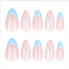 Mivota press-on nails with included glue being applied for a secure, quick bond
