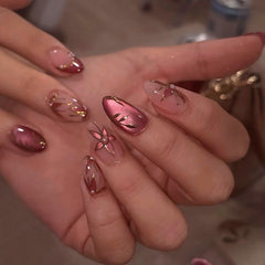 Mivota front view of almond red cat eye nails showing autumn elegance