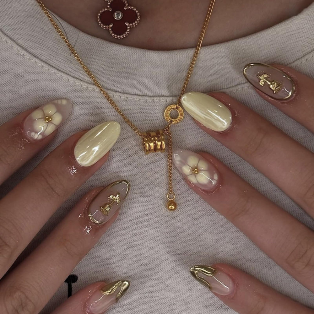 Mivota front packaging showing yellow floral almond nails and elegant set appeal
