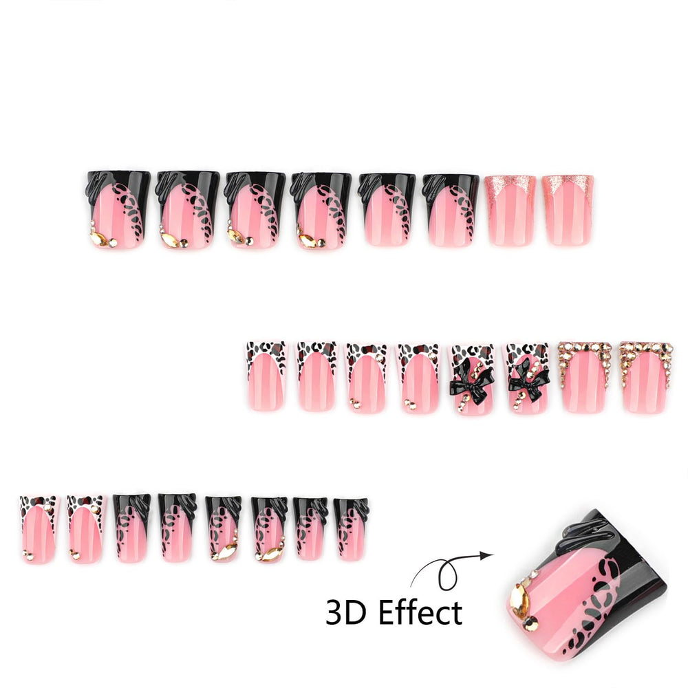 Mivota rhinestone and gold bow close detail adding sparkle and luxury to nails