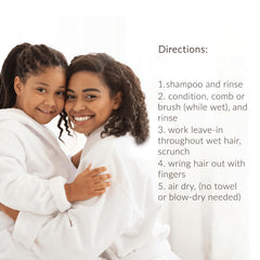 Mixed Chicks after-detangle happy child with smooth manageable hair