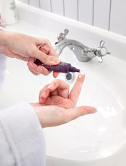 MIZON applying cream under eye demonstrating quick absorption benefit