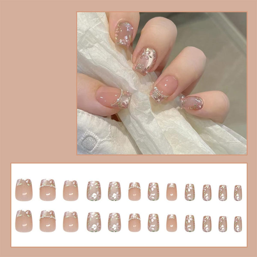 MJJNTTN hand applying press-on nails demonstrating quick at-home manicure benefit