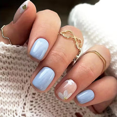 MMNHJHUT front packaging showing 24 light blue floral press-on nails for easy styling