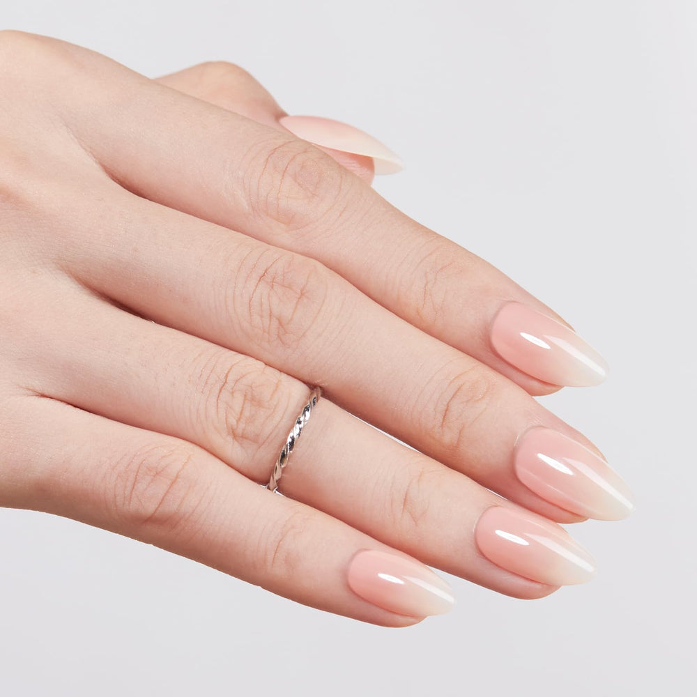 Modelones almond-shaped nails top view demonstrating elegant tapered silhouette