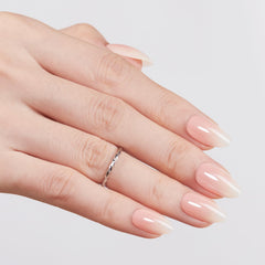Modelones almond-shaped nails top view demonstrating elegant tapered silhouette