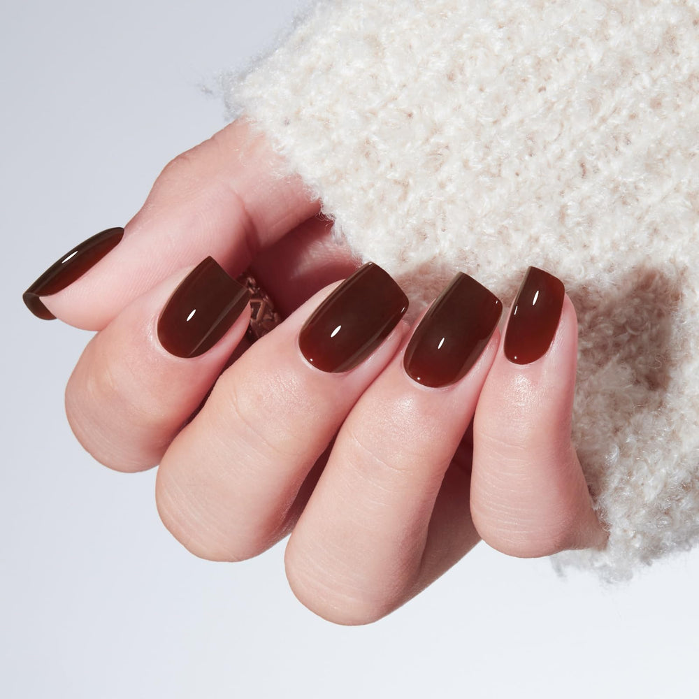 modelones close-up of semi-transparent brown nail texture and polished look