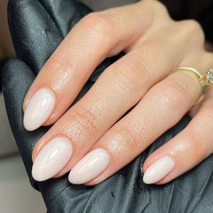 modelones front packaging showing milky white almond nails and kit contents for immediate wear
