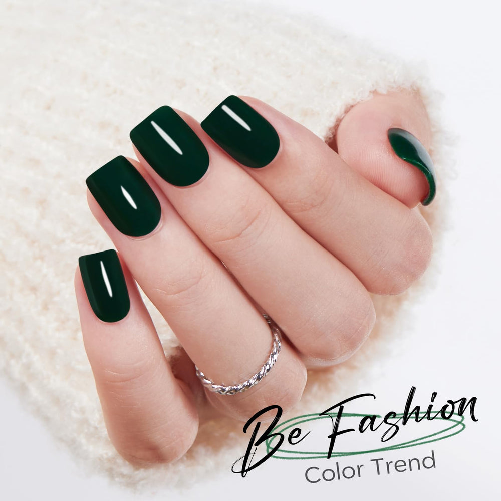 modelones on-model hand wearing dark green nails for polished look