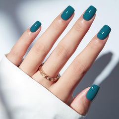 modelones front packaging showing hazy blue press-on nails and kit benefits