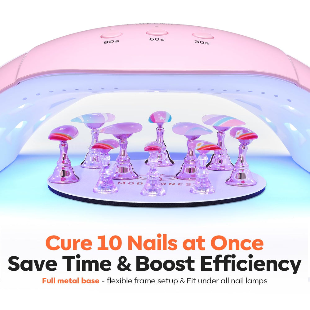 modelones nail stands in use with hands painting press-ons showing practical stability during work