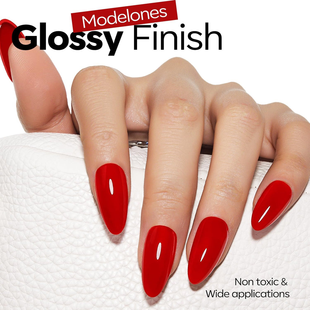 modelones on nails in use highlighting salon-quality ruby red and long wear