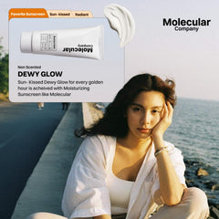 Molecular Company tube beside hand for size and portable convenience comparison