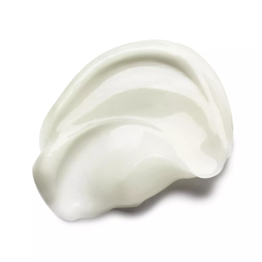Molton Brown conditioner texture on hand highlighting smooth slip and hydration benefit
