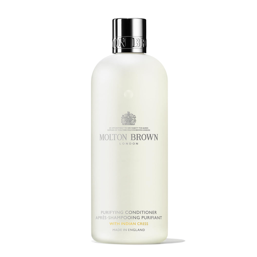 Molton Brown bottle front label showing product and volume, elegant presentation benefit