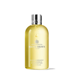 Molton Brown front bottle view showing citrus packaging and easy-grip design benefit