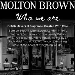 Molton Brown refill on bathroom shelf creating a luxurious citrus atmosphere