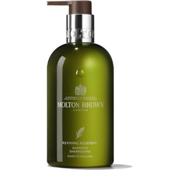 Molton Brown shampoo front bottle showing label and travel-friendly size with elegant presentation