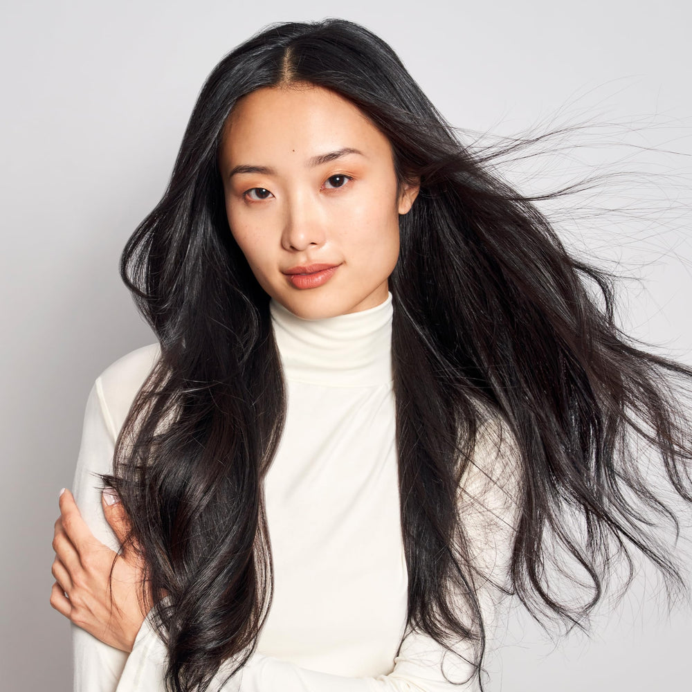 MONAT products styled on bathroom shelf showing routine-ready appeal