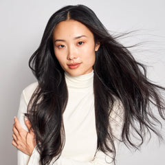 MONAT products styled on bathroom shelf showing routine-ready appeal