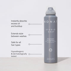 MONAT The Champ spraying in use on roots to instantly absorb oils and refresh hair