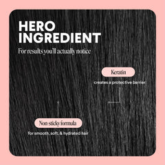 MONDAY HAIRCARE bottle in hand to show size and travel-friendly convenience