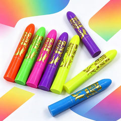 Moonear crayons glowing under UV light highlighting high fluorescence