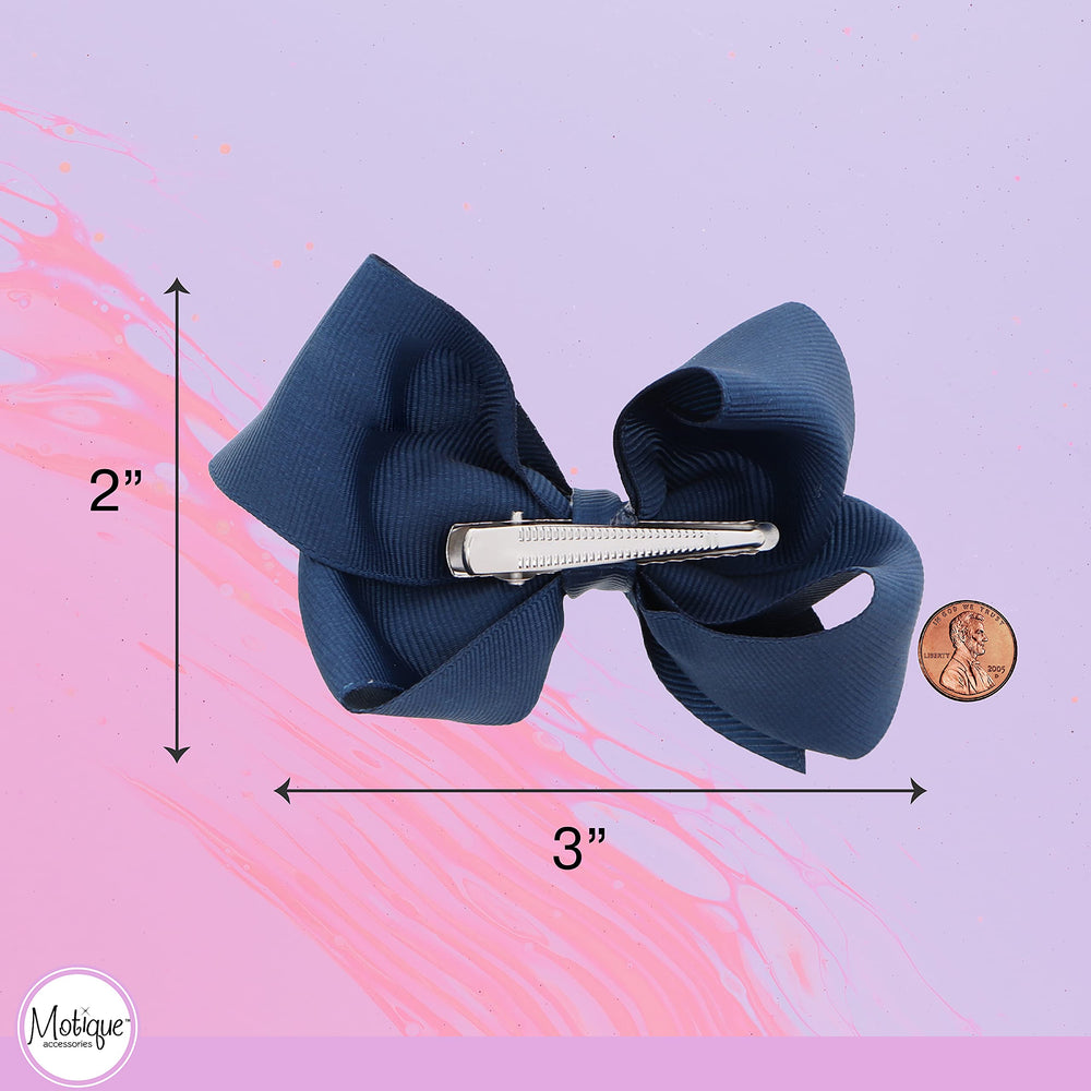 Motique Accessories bow worn in a little girl's ponytail for polished look