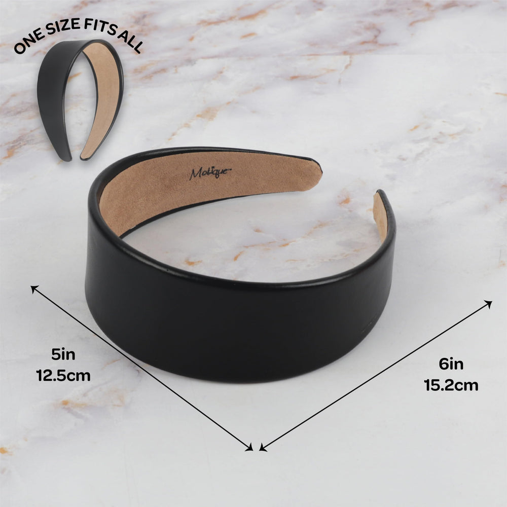 Motique Accessories headband beside hand for size comparison and fit clarity