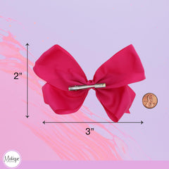 Motique Accessories bow worn by child for playful outfit accent