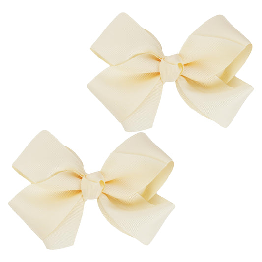 Motique Accessories ivory bow front view showing neat shape and classic style