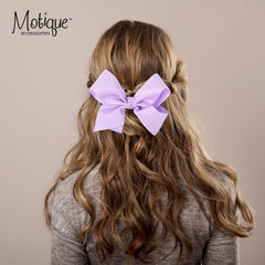 Motique Accessories close-up of grosgrain texture, shows crisp ribbon detail